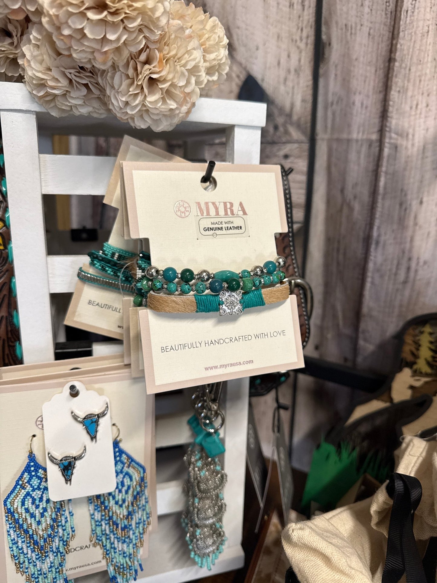 Bunkhouse Studio LLC bracelet featuring leather and metal accents with rustic, handcrafted design and adjustable closure.