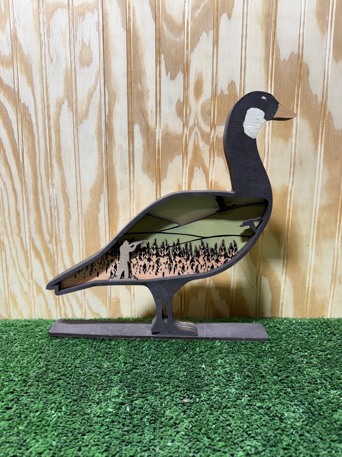 Realistic goose decoy for hunting by Bunkhouse Studio LLC, designed to attract waterfowl during hunting trips.