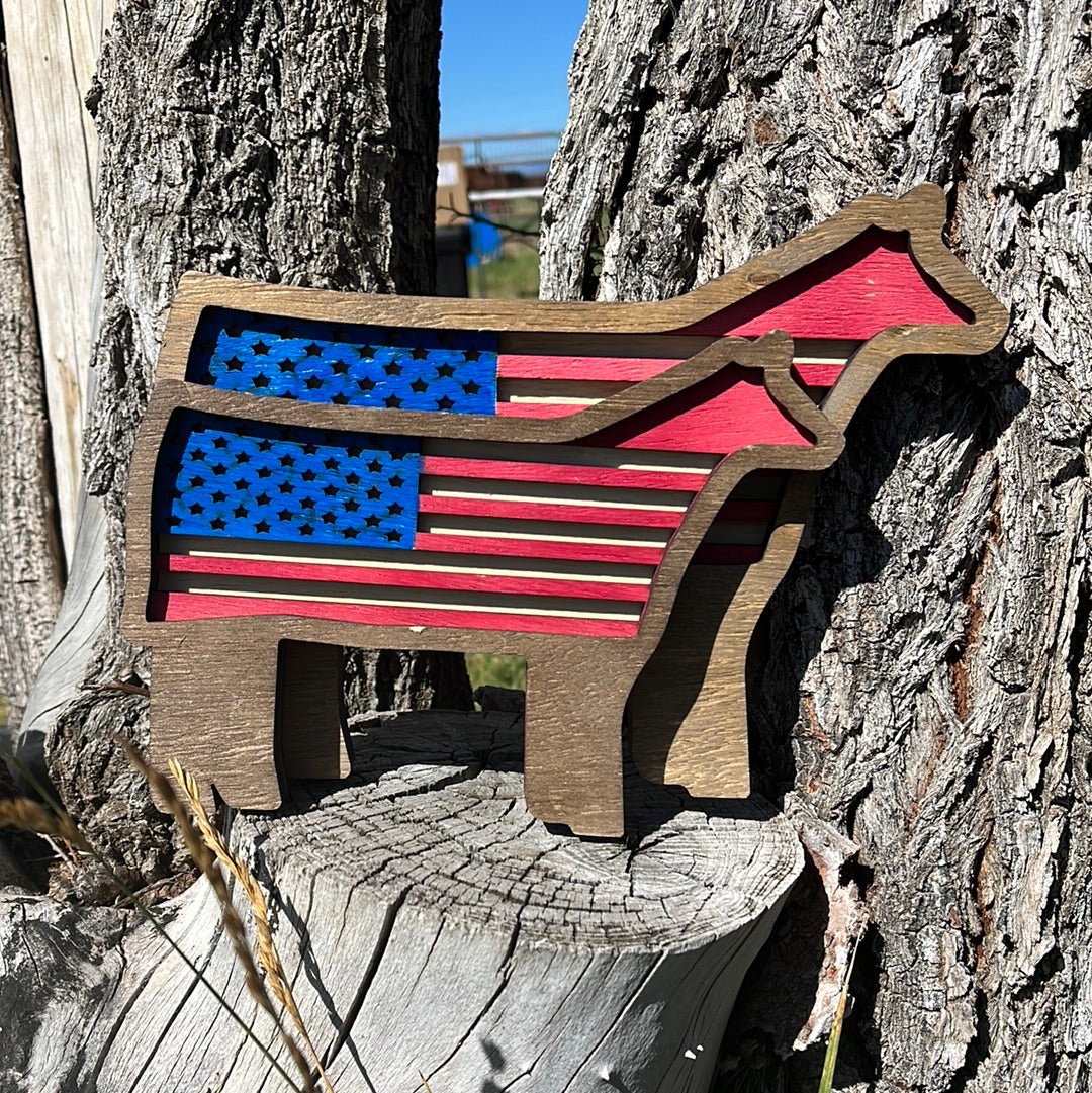 Cattle USA flag featuring red, white, and blue stripes with a prominent white star on a blue field, representing American cattle ranching.
