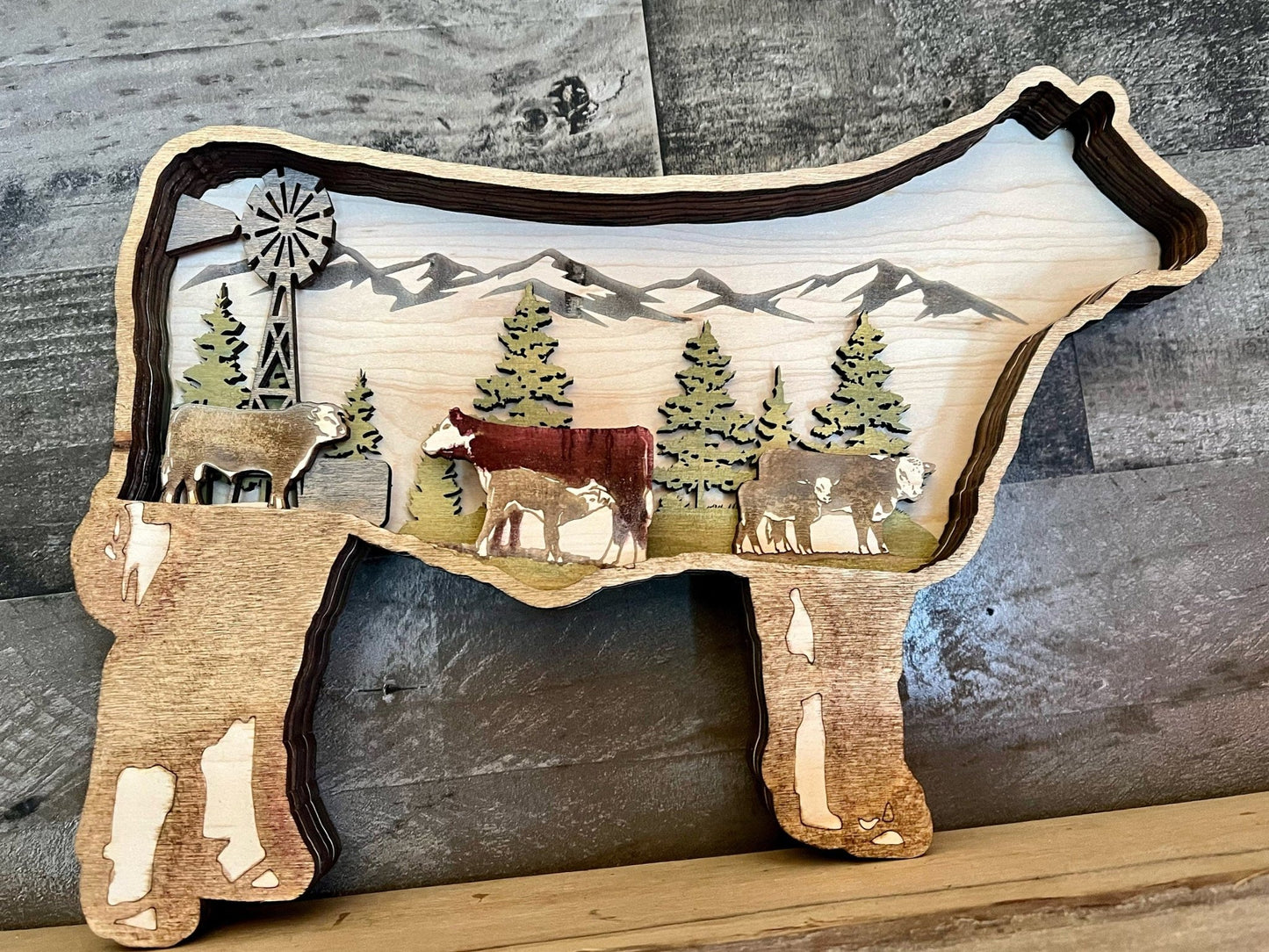 Handmade Hereford steer with herd decor, rustic farm gift by Bunkhouse Studio LLC, featuring detailed handcrafted ranch farm design.