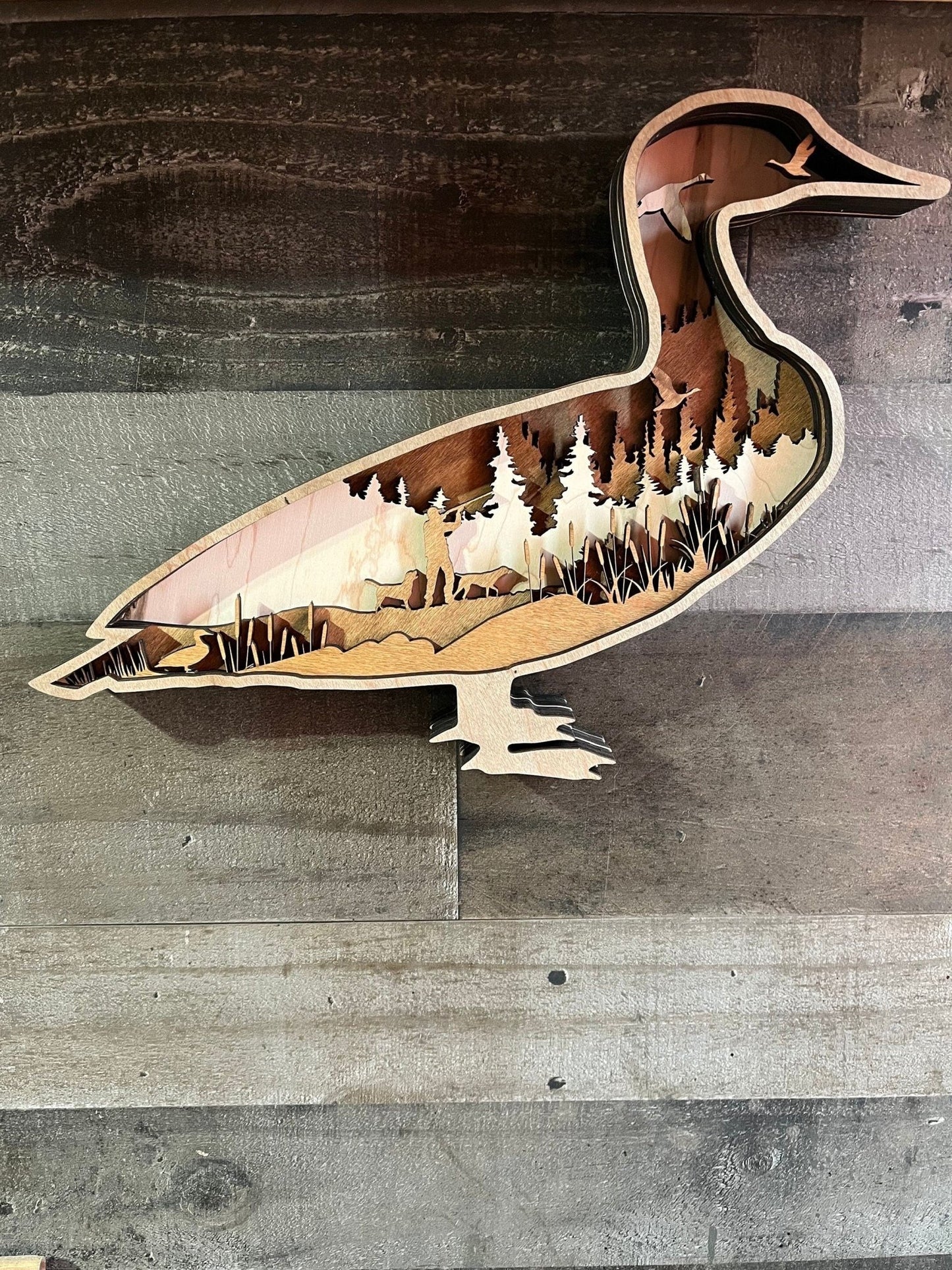Layer Duck Hunting decor wall hanging featuring a rustic design, perfect for mancaves and hunting gift displays.