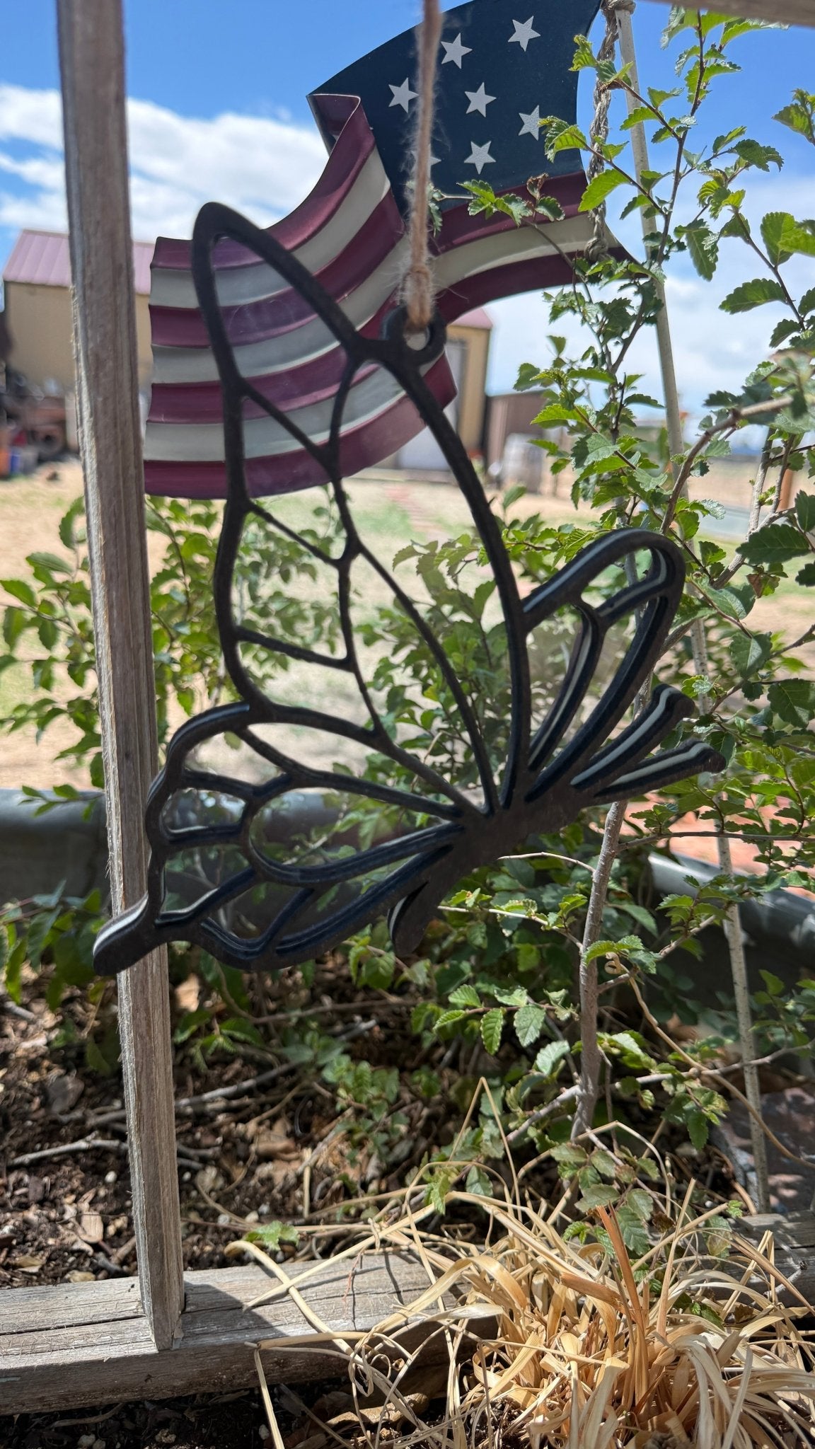 Rustic modern butterfly lover sun catcher window decor with colorful glass butterfly design, handcrafted by Bunkhouse Studio LLC