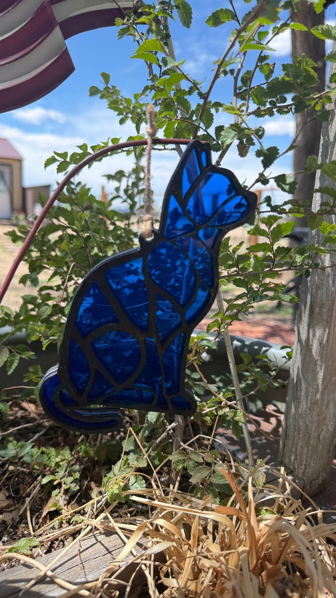 Rustic modern cat lover sun catcher window decor with a cat silhouette, handcrafted by Bunkhouse Studio LLC.
