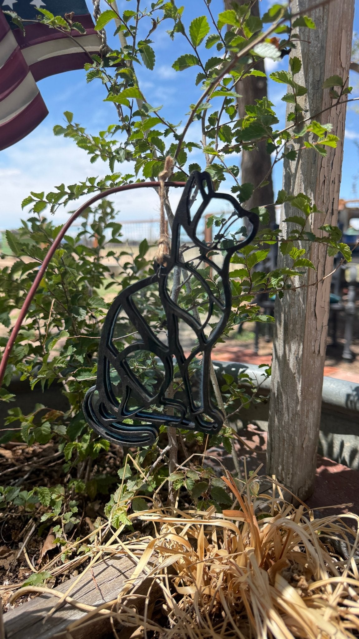 Rustic modern cat lover sun catcher window decor with metal cat silhouette and colorful stained glass accents.
