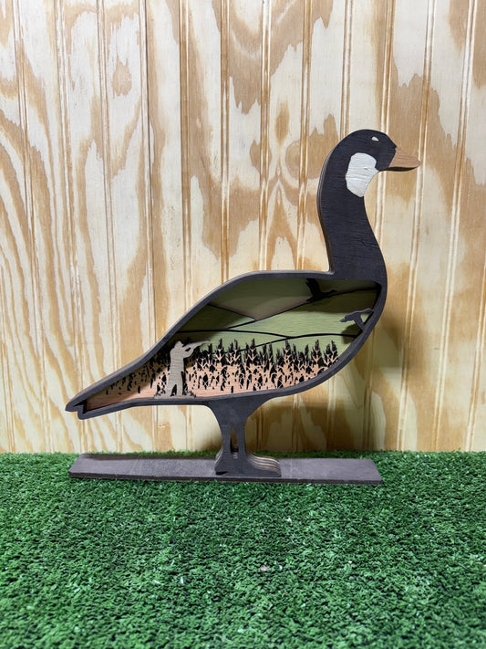 Realistic goose decoy for hunting by Bunkhouse Studio LLC, designed to attract waterfowl during hunting trips.