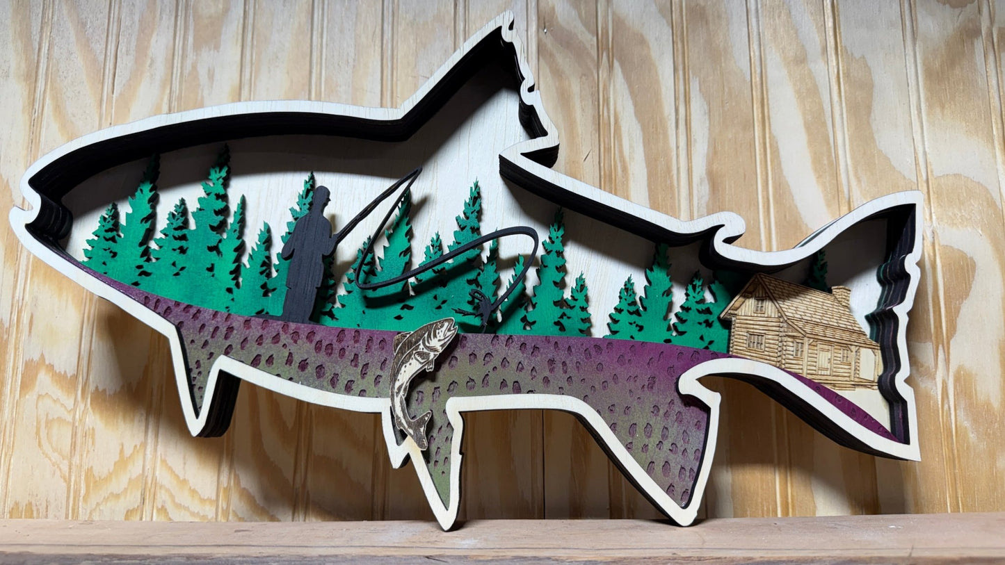 Handcrafted wooden trout wall art featuring a fly fisherman scene, ideal rustic cabin or lodge décor from Bunkhouse Studio LLC.