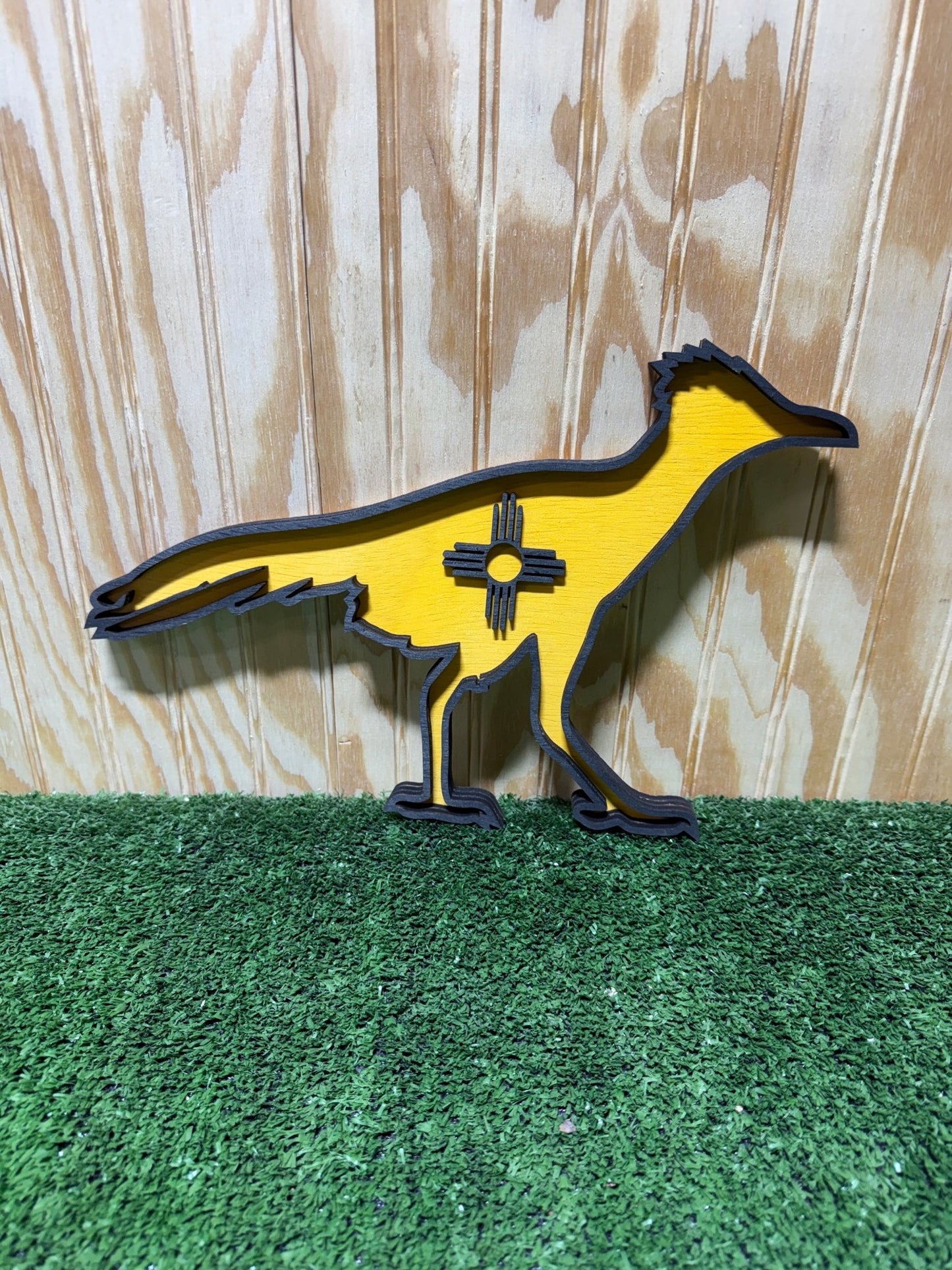 Colorful New Mexico Roadrunner sculpture by Bunkhouse Studio LLC, detailed ceramic artwork with vibrant southwestern design.