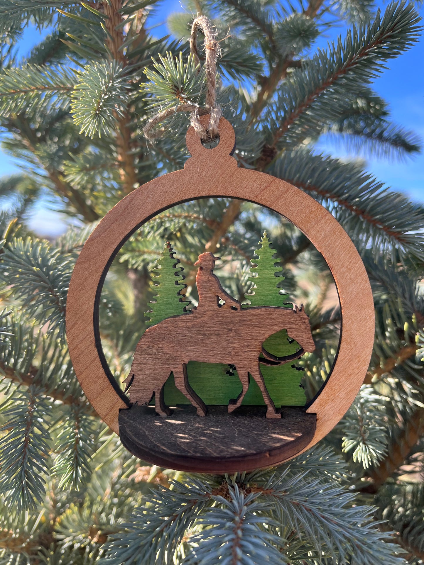 Two-layer circular ornament by Bunkhouse Studio LLC featuring a detailed design on a white background.