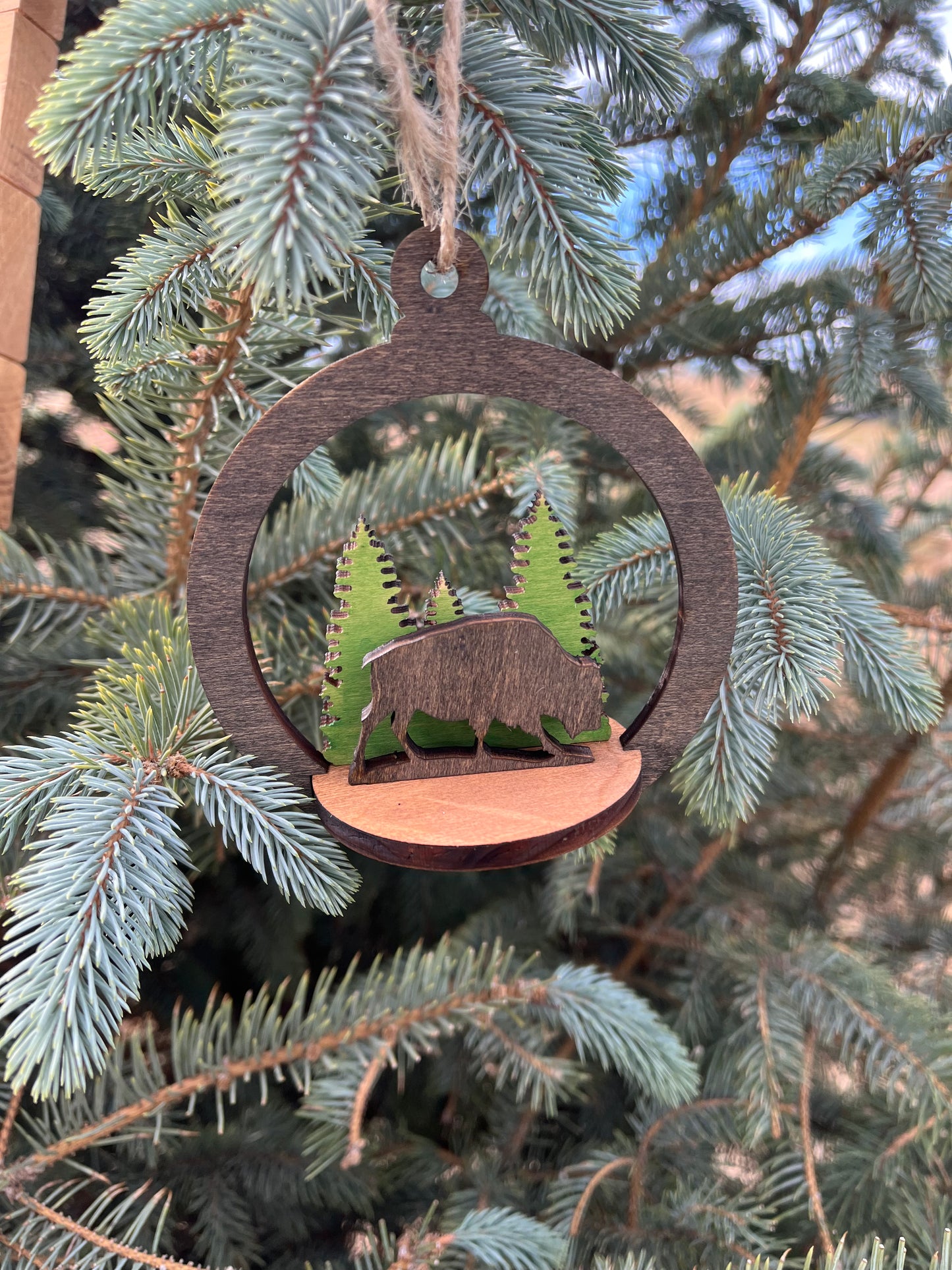 Two-layer circle ornament by Bunkhouse Studio LLC featuring intricate layered design and smooth finish.